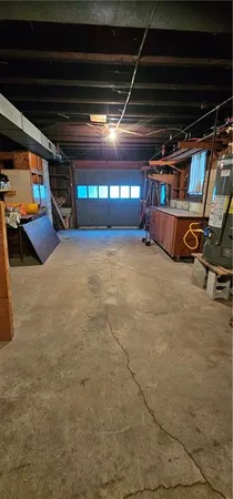 a view of a room with wooden walls