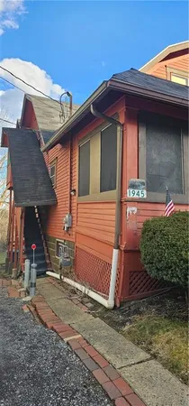 a house view with a backyard