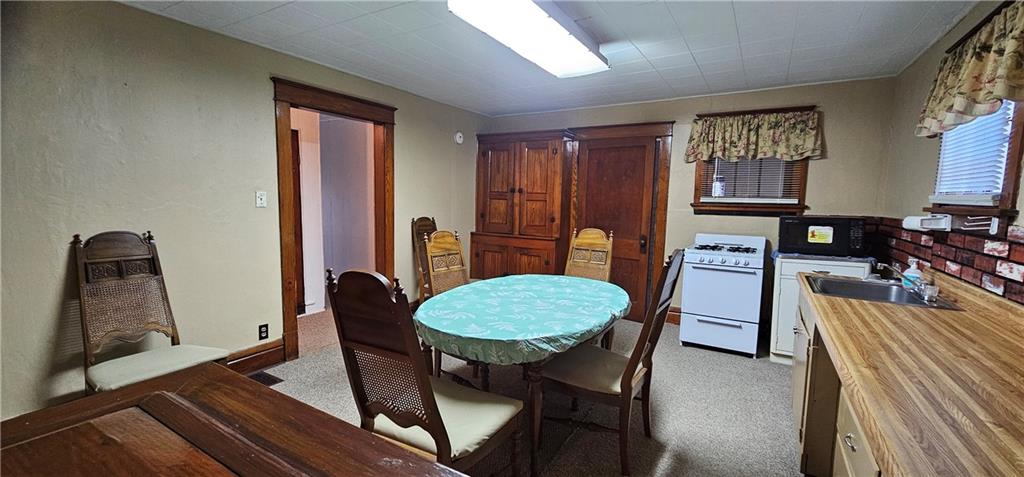 1945 Morris Street New Castle, PA 16102 - Photo 5 of 41 a dining room with furniture and window