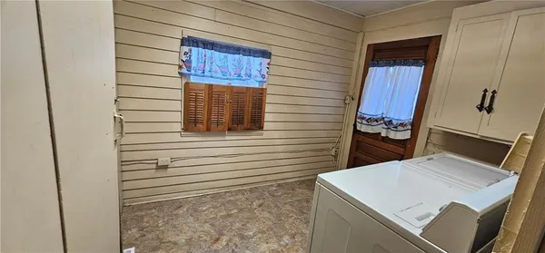 a view of kitchen and utility room