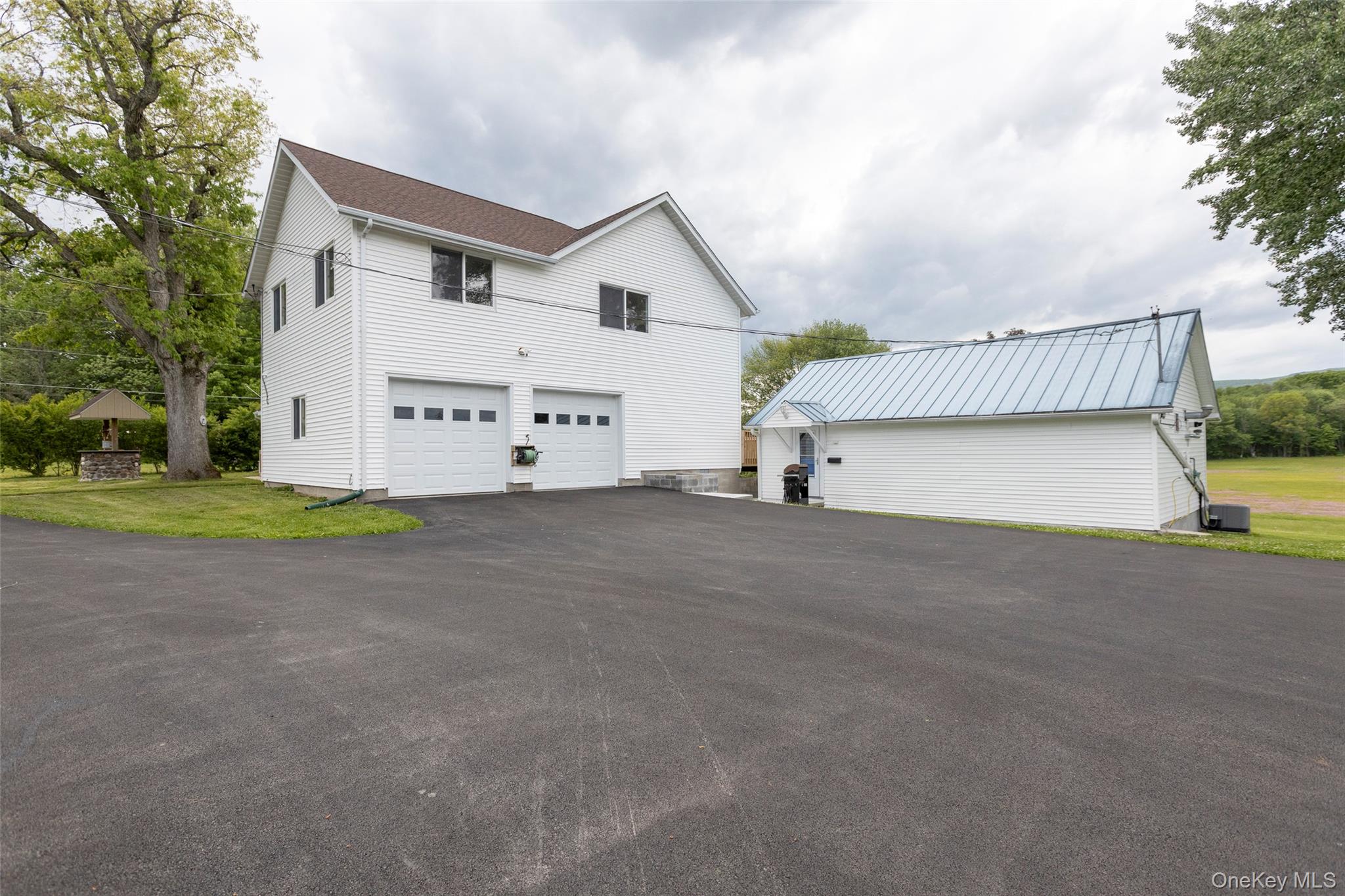 4 Low Road Wallkill, NY 12589 - Photo 24 of 50 garage with view of cottage