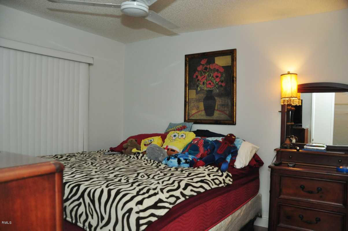 8681 Jasmine Way, Unit C Boca Raton, FL 33496 - Photo 15 of 24 2nd Bedroom