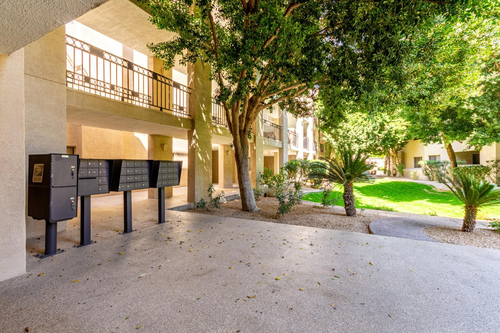 5104 North 32nd Street, Unit 225 Phoenix, AZ 85018 - Photo 12 of 31 a view of a house with a yard and sitting area