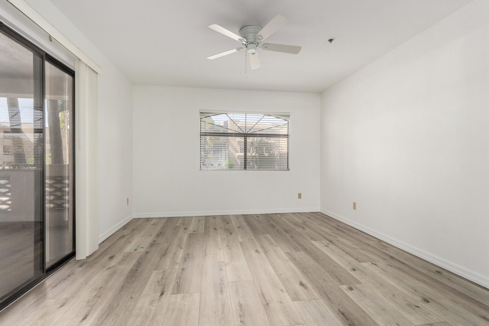 5104 North 32nd Street, Unit 225 Phoenix, AZ 85018 - Photo 13 of 31 wooden floor in an empty room with a window