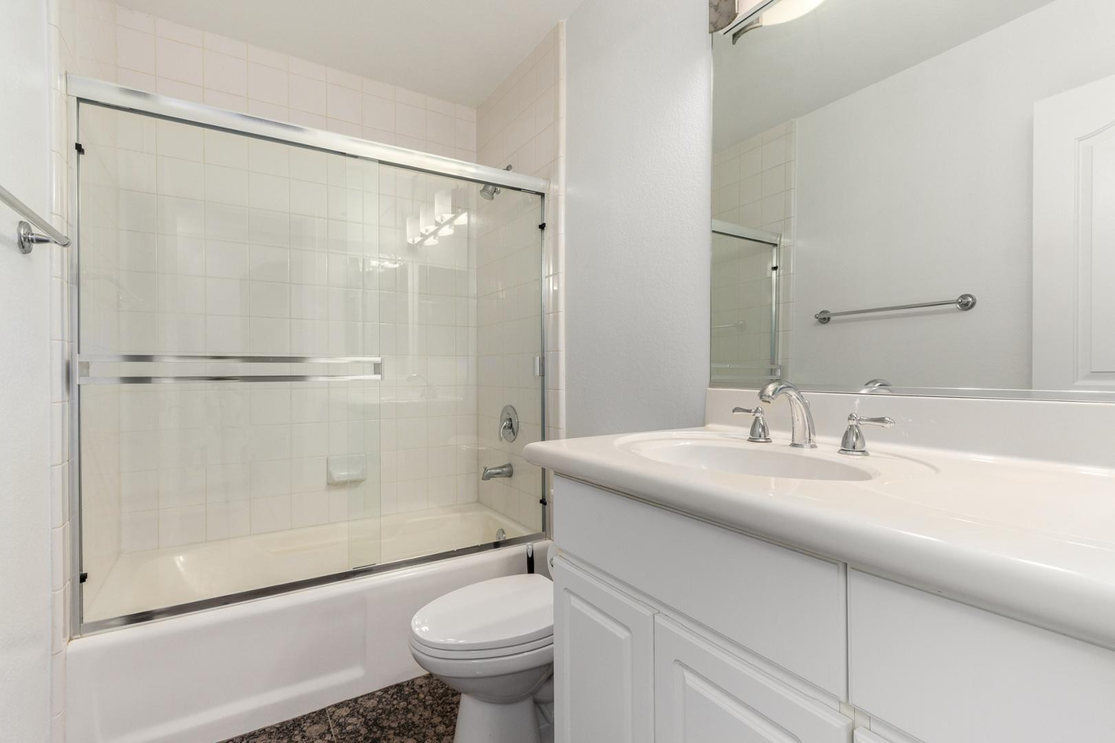 5104 North 32nd Street, Unit 225 Phoenix, AZ 85018 - Photo 15 of 31 a bathroom with a sink toilet and shower