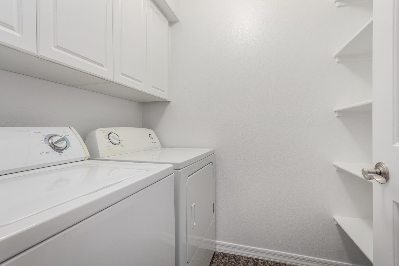 5104 North 32nd Street, Unit 225 Phoenix, AZ 85018 - Photo 7 of 31 a utility room with dryer and washer