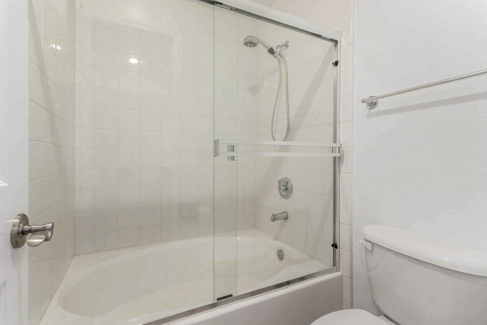 5104 North 32nd Street, Unit 225 Phoenix, AZ 85018 - Photo 8 of 31 a bathroom with a shower and a bathtub