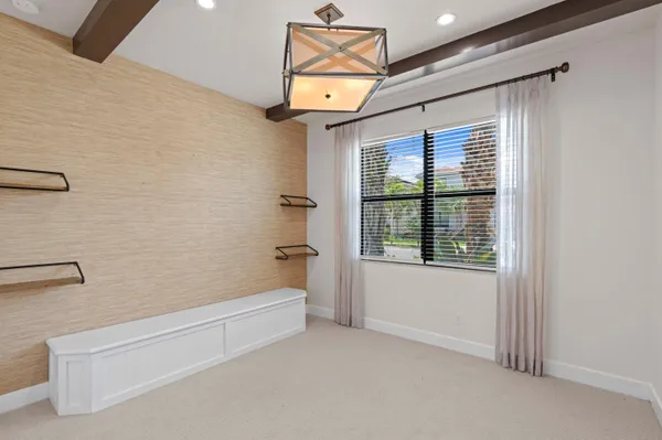 a bathroom with a bathtub and a window
