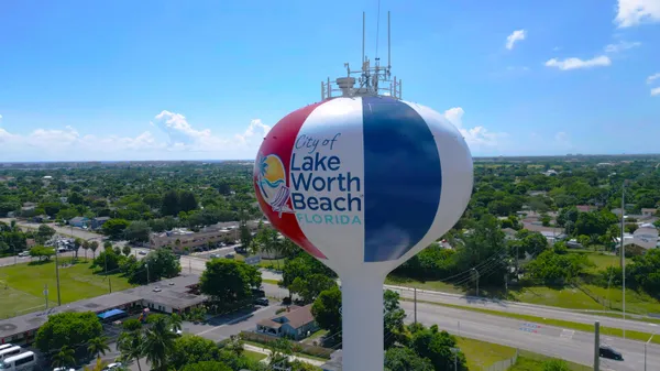 a view of a city with a lake