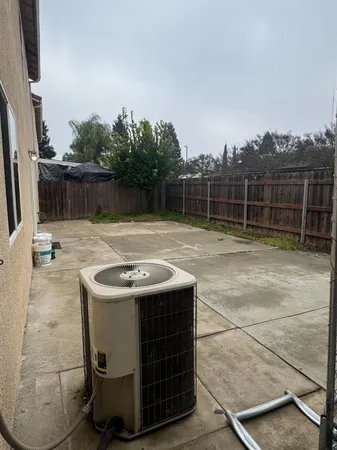 a backyard of a house with lots of green space