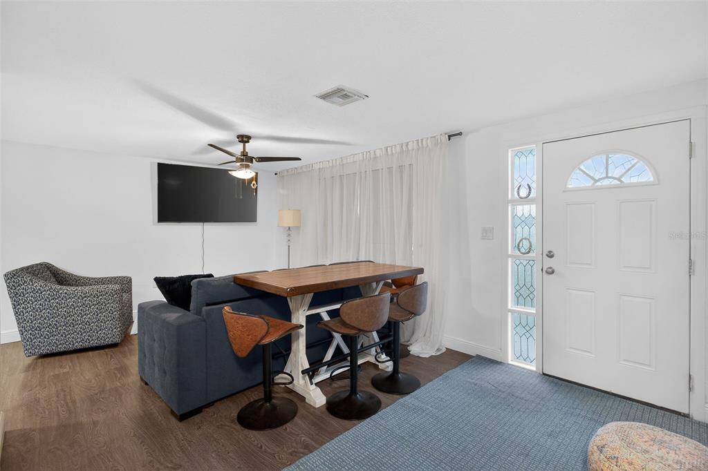 3214 Huntington Road Holiday, FL 34691 - Photo 5 of 26 a living room with furniture and a flat screen tv