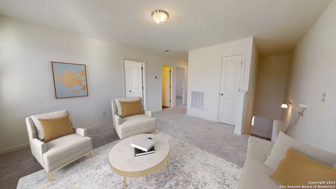 1038 Sharpie Lane Adkins, TX 78101 - Photo 6 of 10 a living room with furniture and a rug