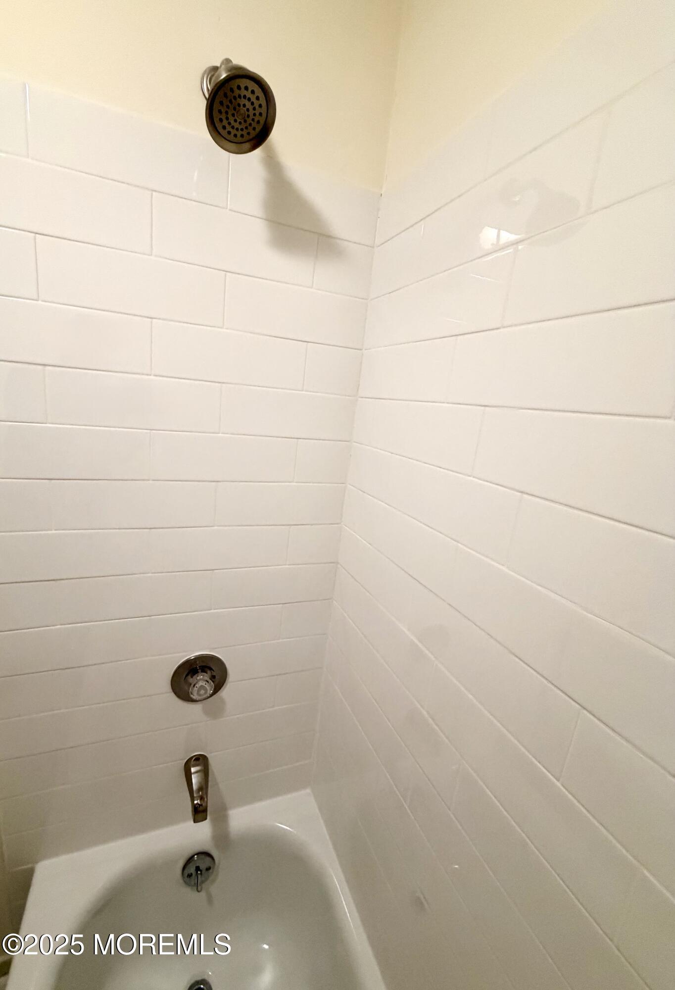 842 B Inverness Court Lakewood, NJ 08701 - Photo 13 of 18 a bathroom with a shower