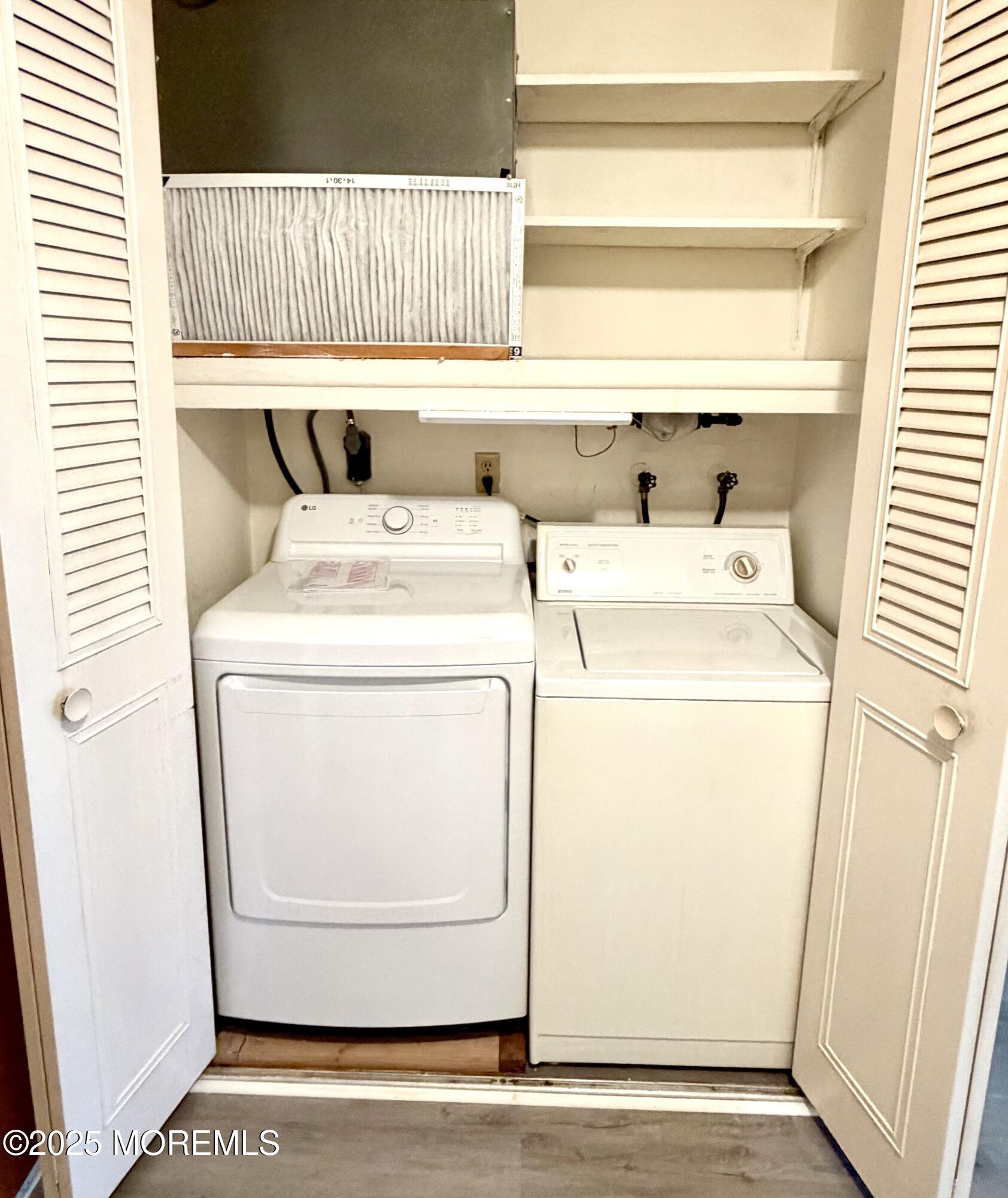 842 B Inverness Court Lakewood, NJ 08701 - Photo 16 of 18 a utility room with dryer and washer