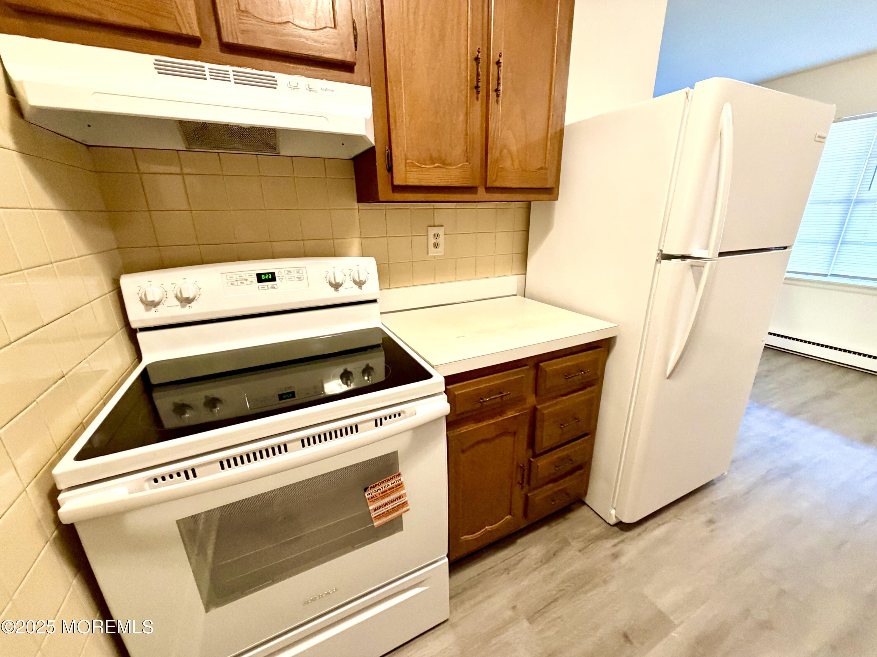 842 B Inverness Court Lakewood, NJ 08701 - Photo 9 of 18 a utility room with dryer and washer