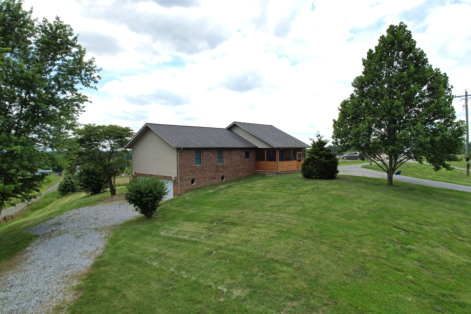5488 Tick Ridge Road Grand Chain, IL 62941 - Photo 3 of 55 a view of a house with yard and a garden