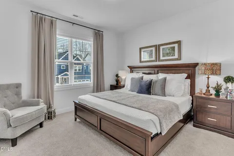 a bed room with a bed and a couch