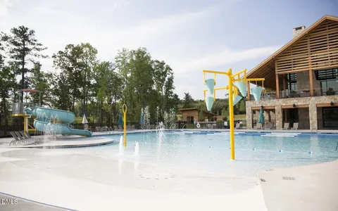 swimming pool view with a outdoor space