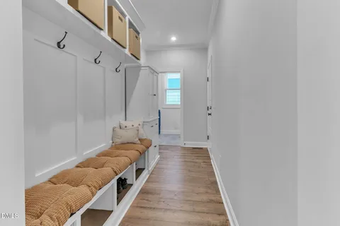 a hallway with view of living room