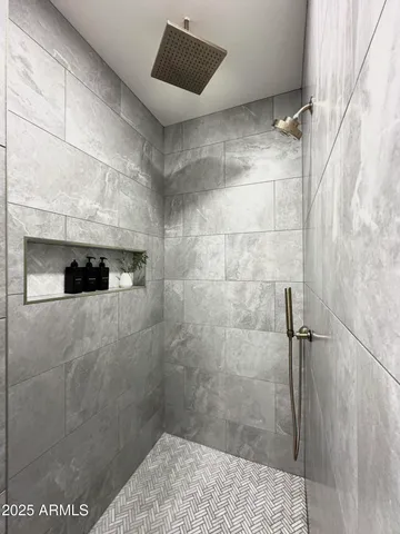 a bathroom with a sink a toilet and bathtub