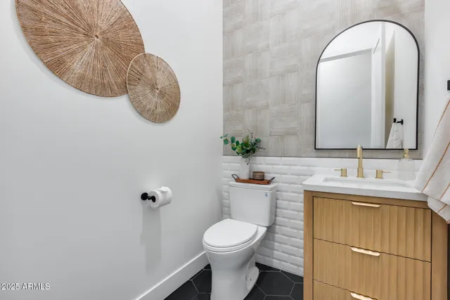 a view of backyard with outdoor seating and plants