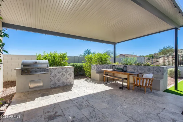 an aerial view of residential building with parking space