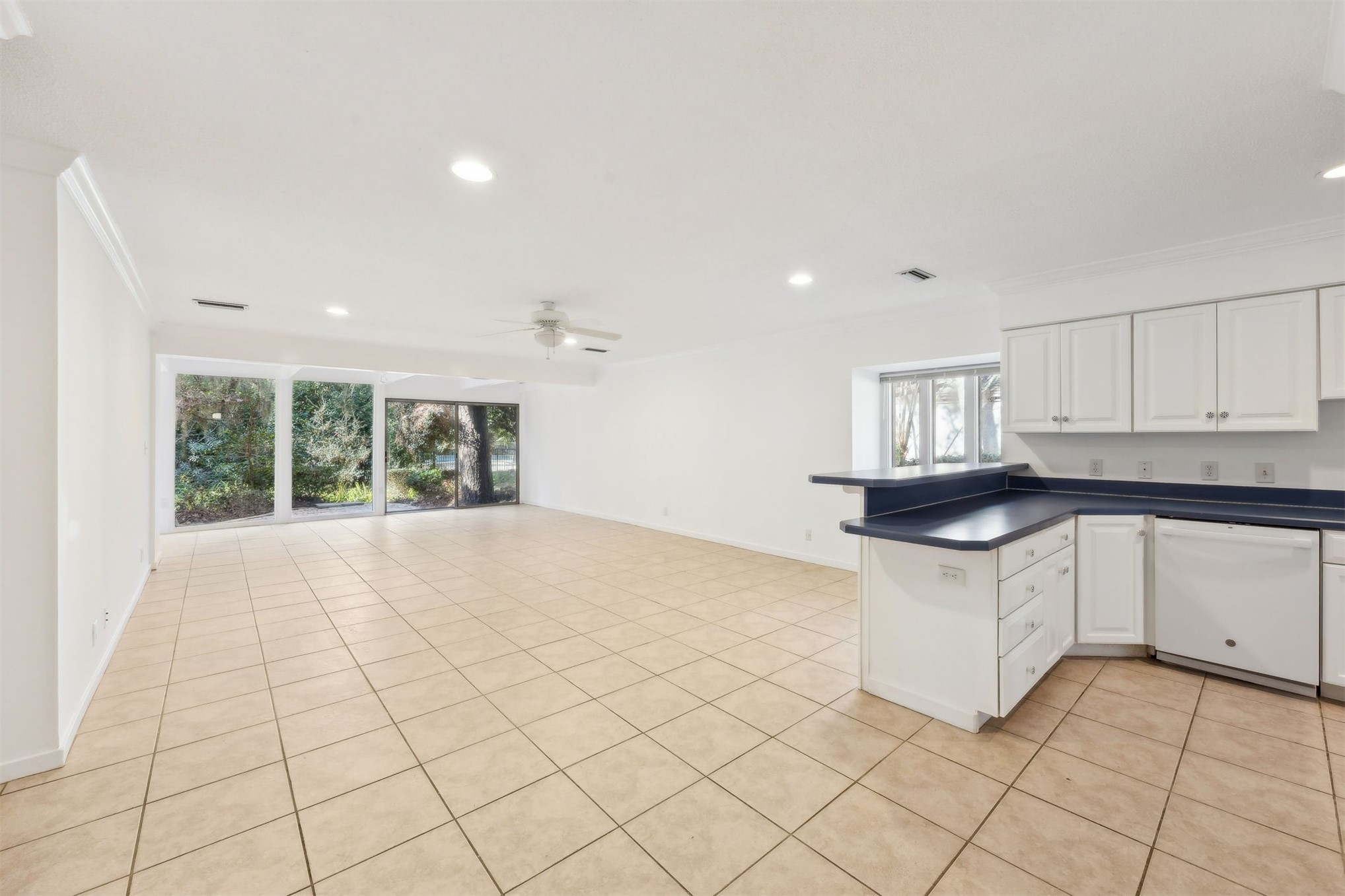 3207 Sea Marsh Road Fernandina Beach, FL 32034 - Photo 3 of 37 a kitchen with stainless steel appliances granite countertop a sink and a white cabinets