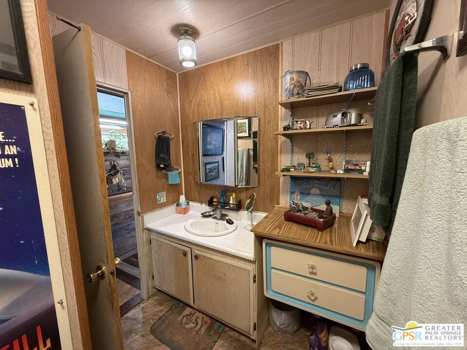 18131 Langlois Road, Unit H1 Desert Hot Springs, CA 92241 - Photo 15 of 44 a room with storage and utility