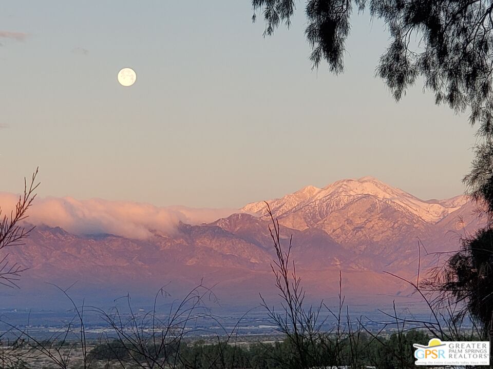 18131 Langlois Road, Unit H1 Desert Hot Springs, CA 92241 - Photo 24 of 44 a view of a backyard of a house
