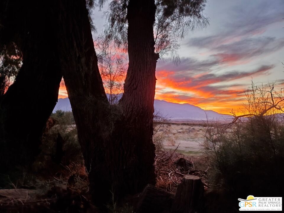 18131 Langlois Road, Unit H1 Desert Hot Springs, CA 92241 - Photo 28 of 44 a view of a backyard of the house