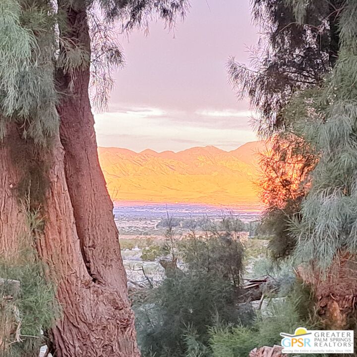 18131 Langlois Road, Unit H1 Desert Hot Springs, CA 92241 - Photo 29 of 44 a view of a sky from a city