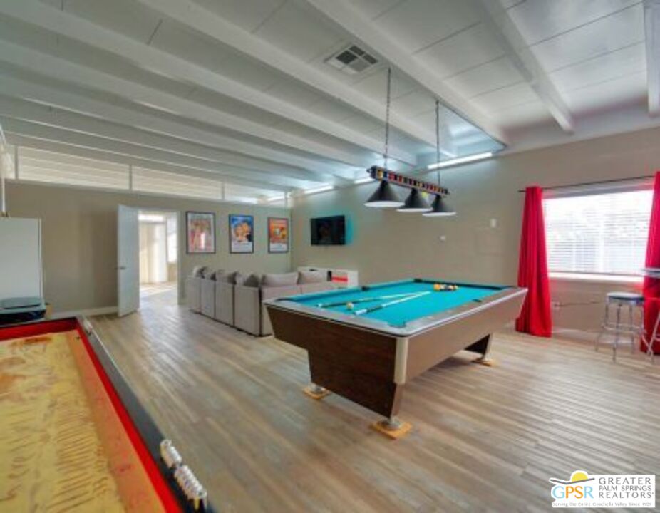 18131 Langlois Road, Unit H1 Desert Hot Springs, CA 92241 - Photo 38 of 44 a room with pool table and windows