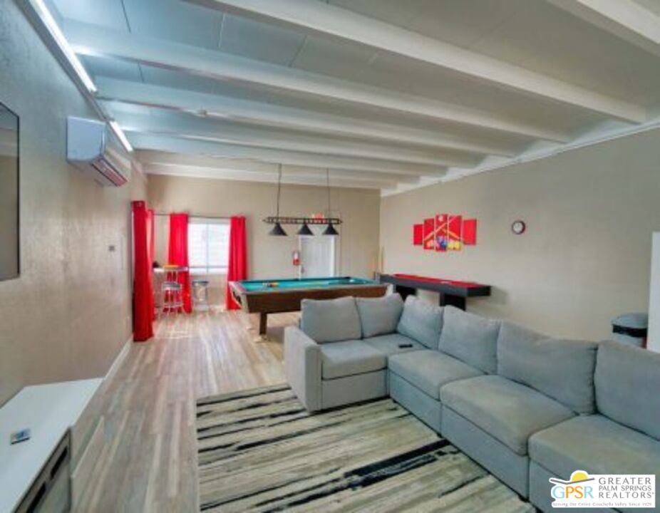 18131 Langlois Road, Unit H1 Desert Hot Springs, CA 92241 - Photo 39 of 44 a living room with furniture and a couch