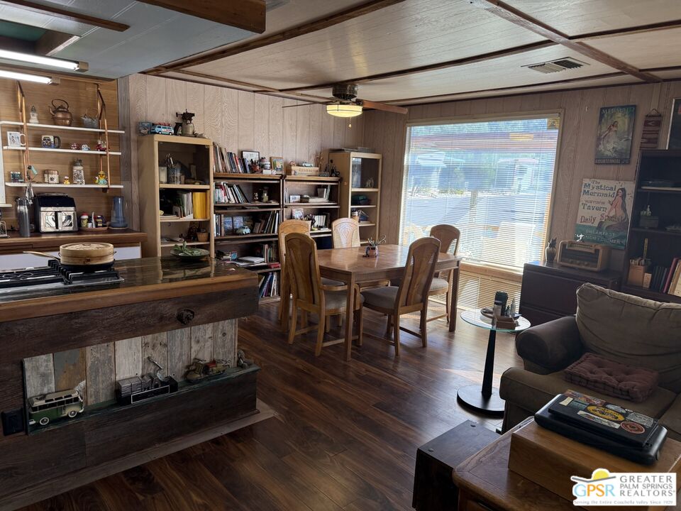 18131 Langlois Road, Unit H1 Desert Hot Springs, CA 92241 - Photo 8 of 44 a living room with furniture a rug and a window