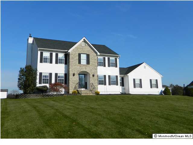 344 Fieldcrest Drive New Egypt, NJ 08533 - Photo 1 of 17 a front view of a house with a yard