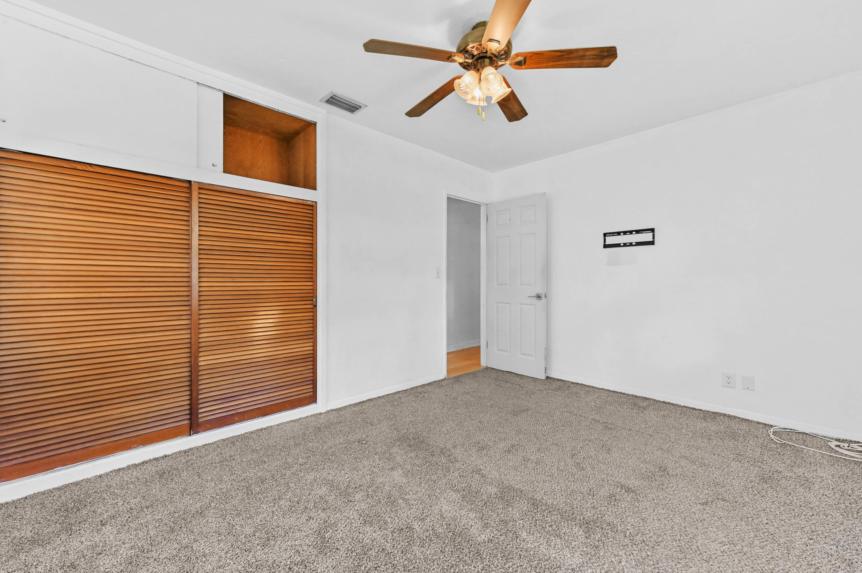 5709 Southeast Indigo Avenue Stuart, FL 34997 - Photo 18 of 26 a view of an empty room