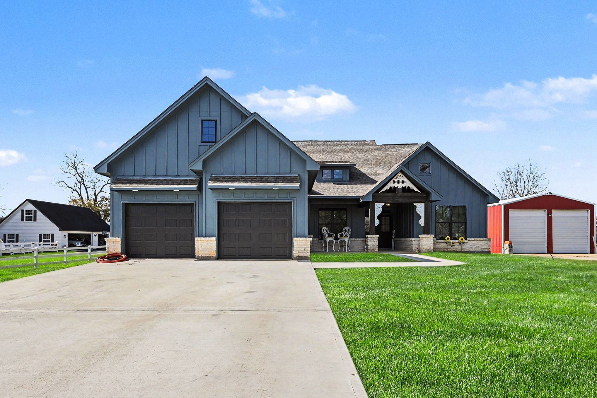 444 Mill Road Angleton, TX 77515 - Photo 1 of 31 a front view of house with yard and green space