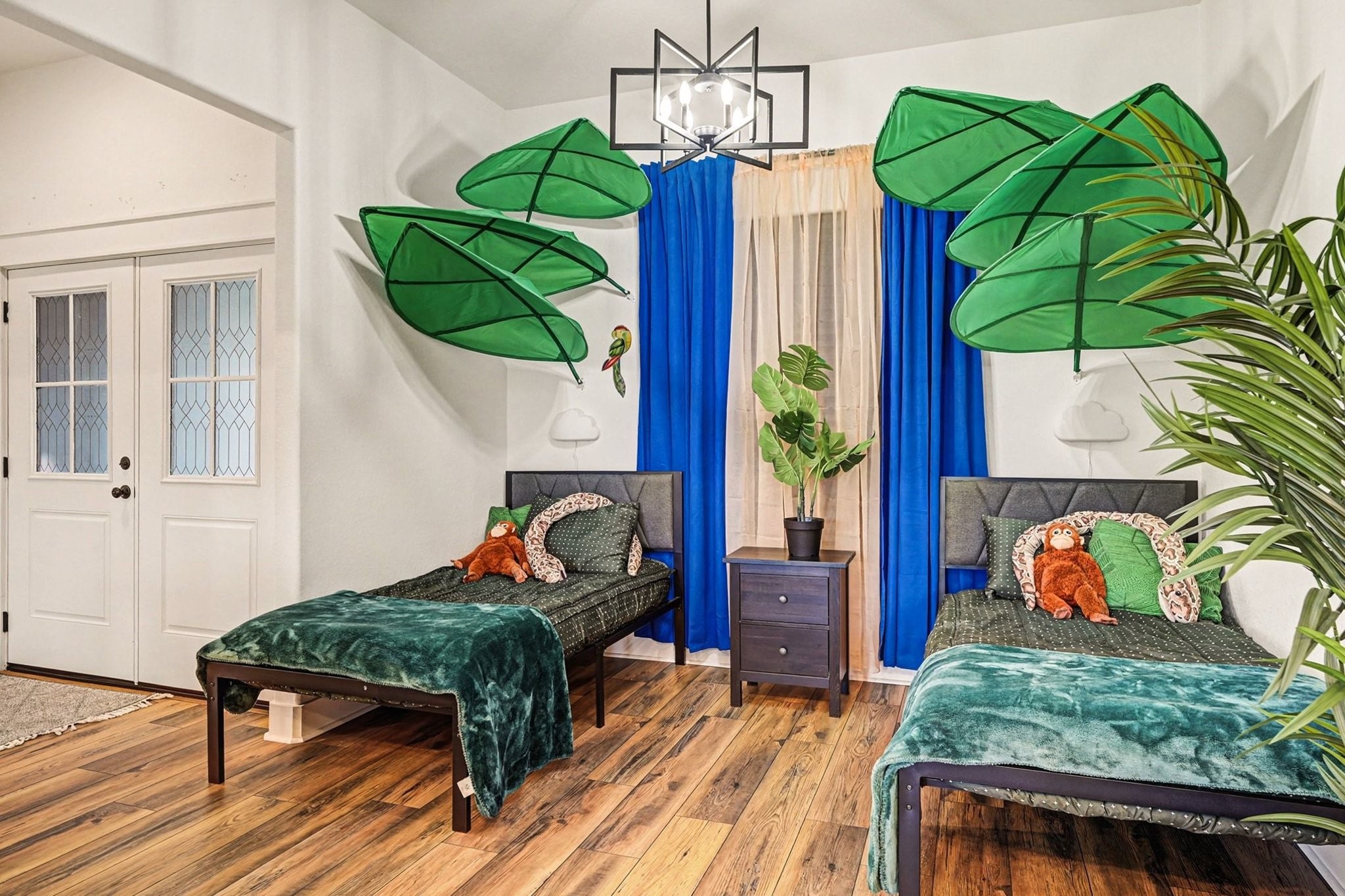 444 Mill Road Angleton, TX 77515 - Photo 20 of 31 a living room filled with furniture and a wooden floor