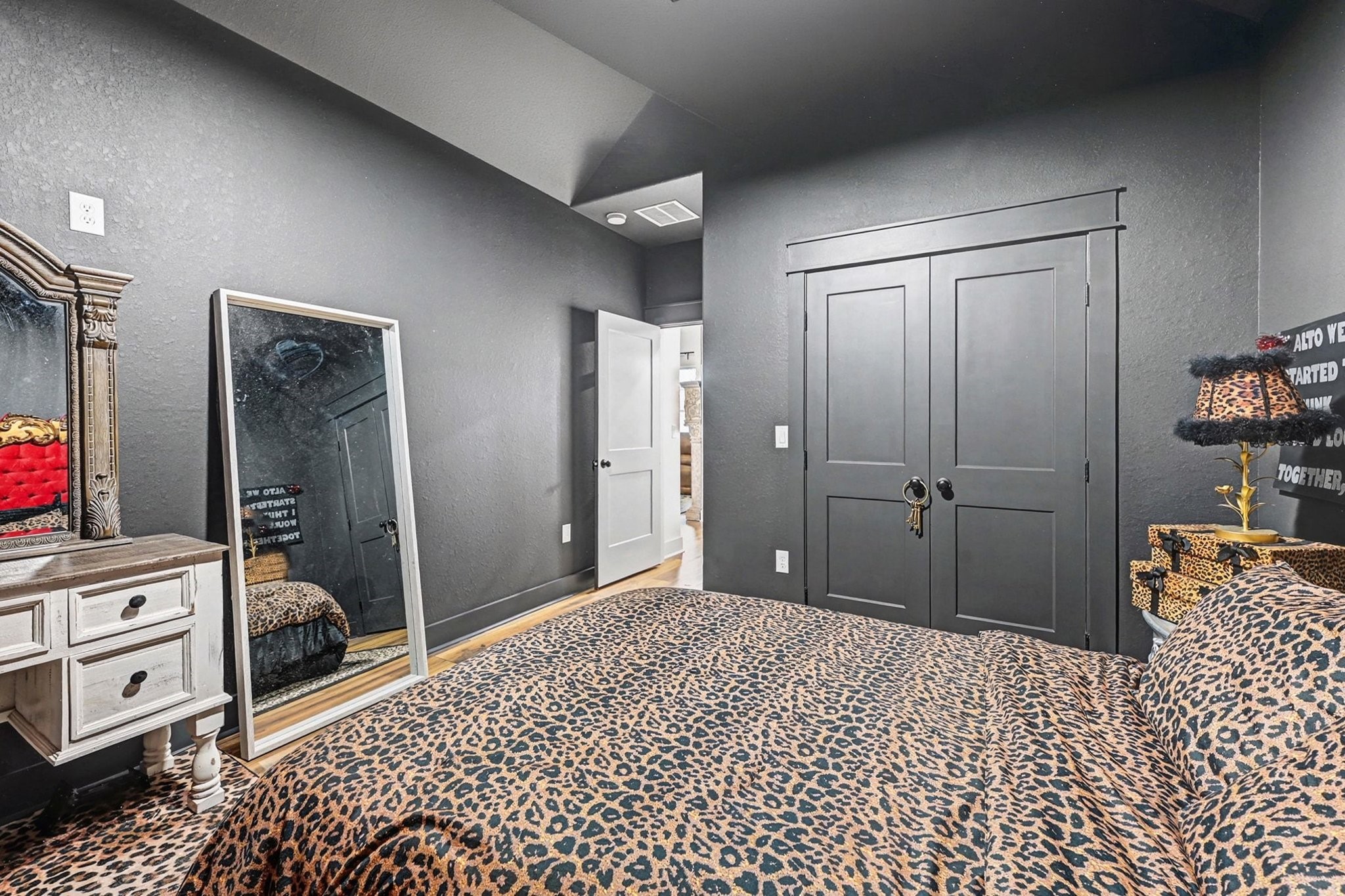 444 Mill Road Angleton, TX 77515 - Photo 24 of 31 a bedroom with a bed and a walk in closet