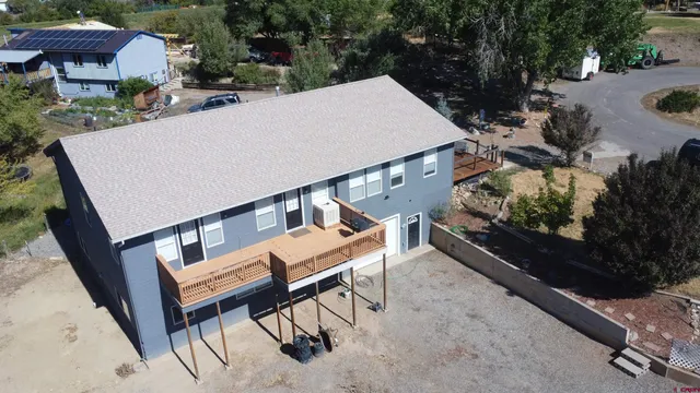 a view of a patio in backyard