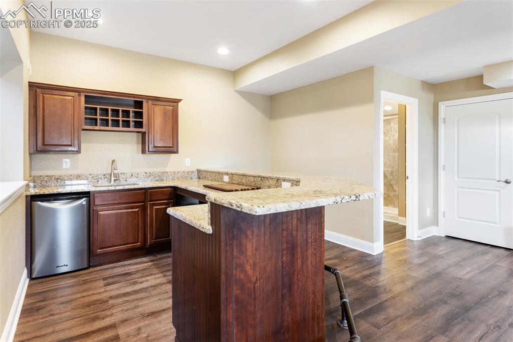 931 Forest View Road Monument, CO 80132 - Photo 38 of 50 a kitchen with a sink and a stove top oven