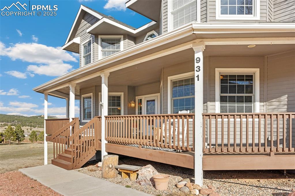 931 Forest View Road Monument, CO 80132 - Photo 6 of 50 a view of a chair with a deck