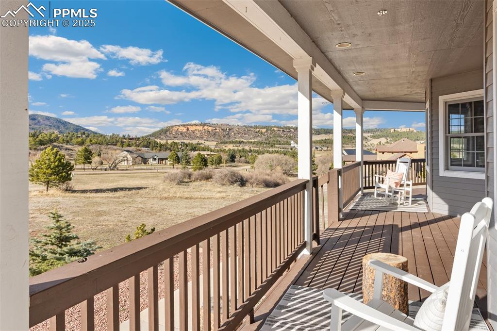 931 Forest View Road Monument, CO 80132 - Photo 7 of 50 a view of a balcony with lake view and a ocean view