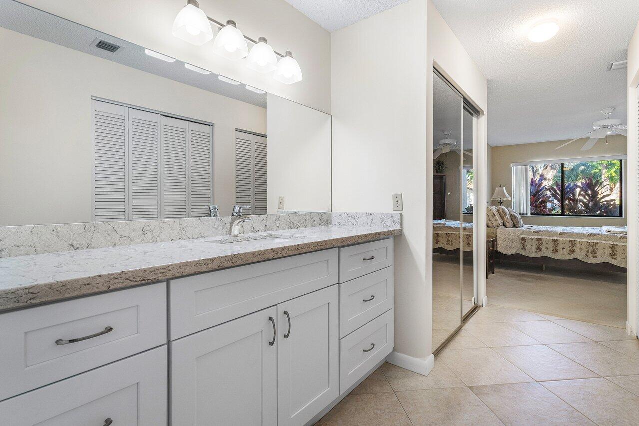 8090 Whispering Palm Drive, Unit A Boca Raton, FL 33496 - Photo 19 of 33 MASTER BATHROOM
