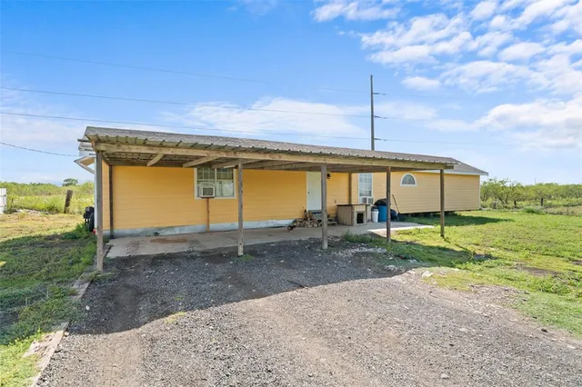 a view of a lake with a big yard