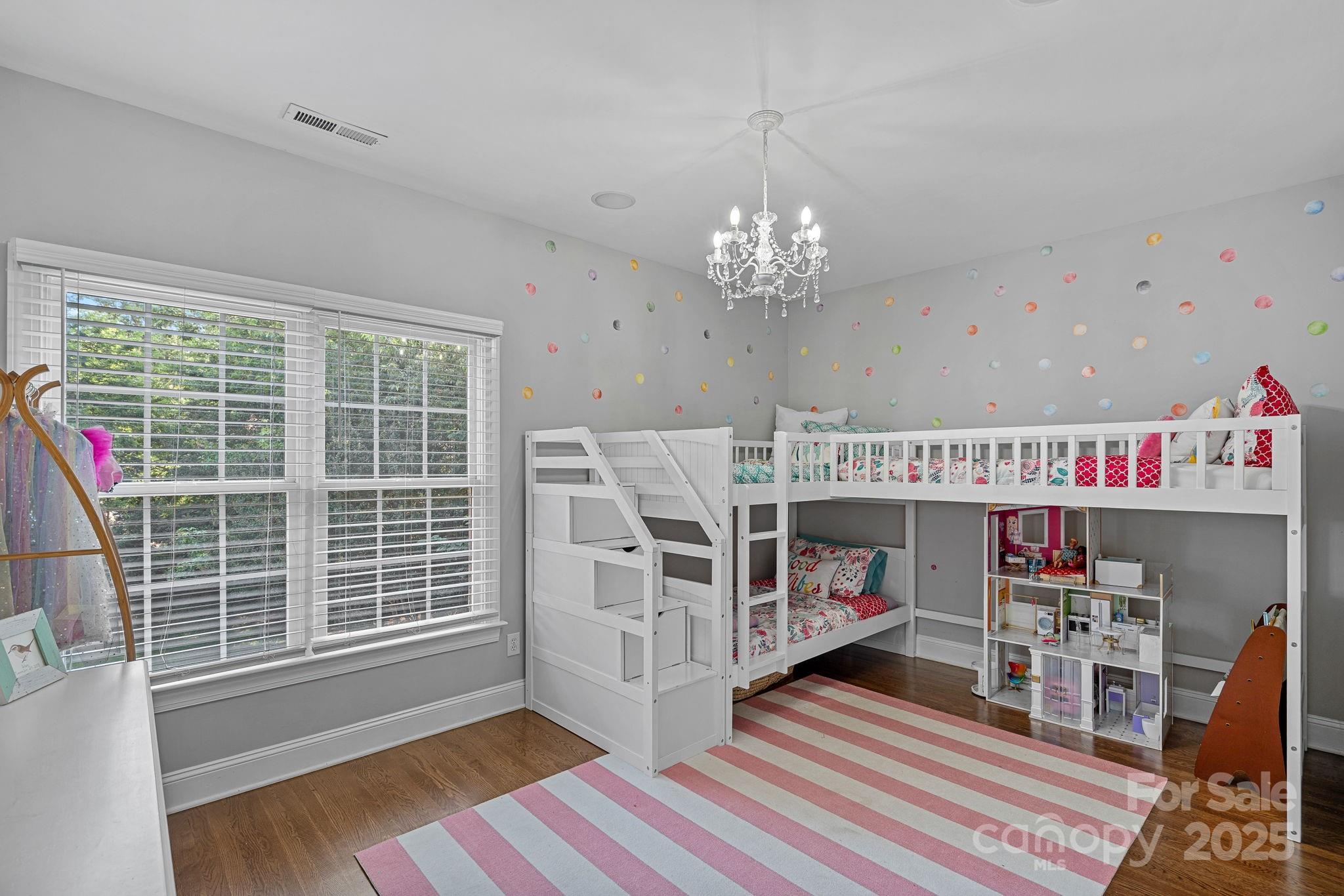 343 Gringley Hill Road Fort Mill, SC 29708 - Photo 19 of 45 a view of an empty room with furniture and a window