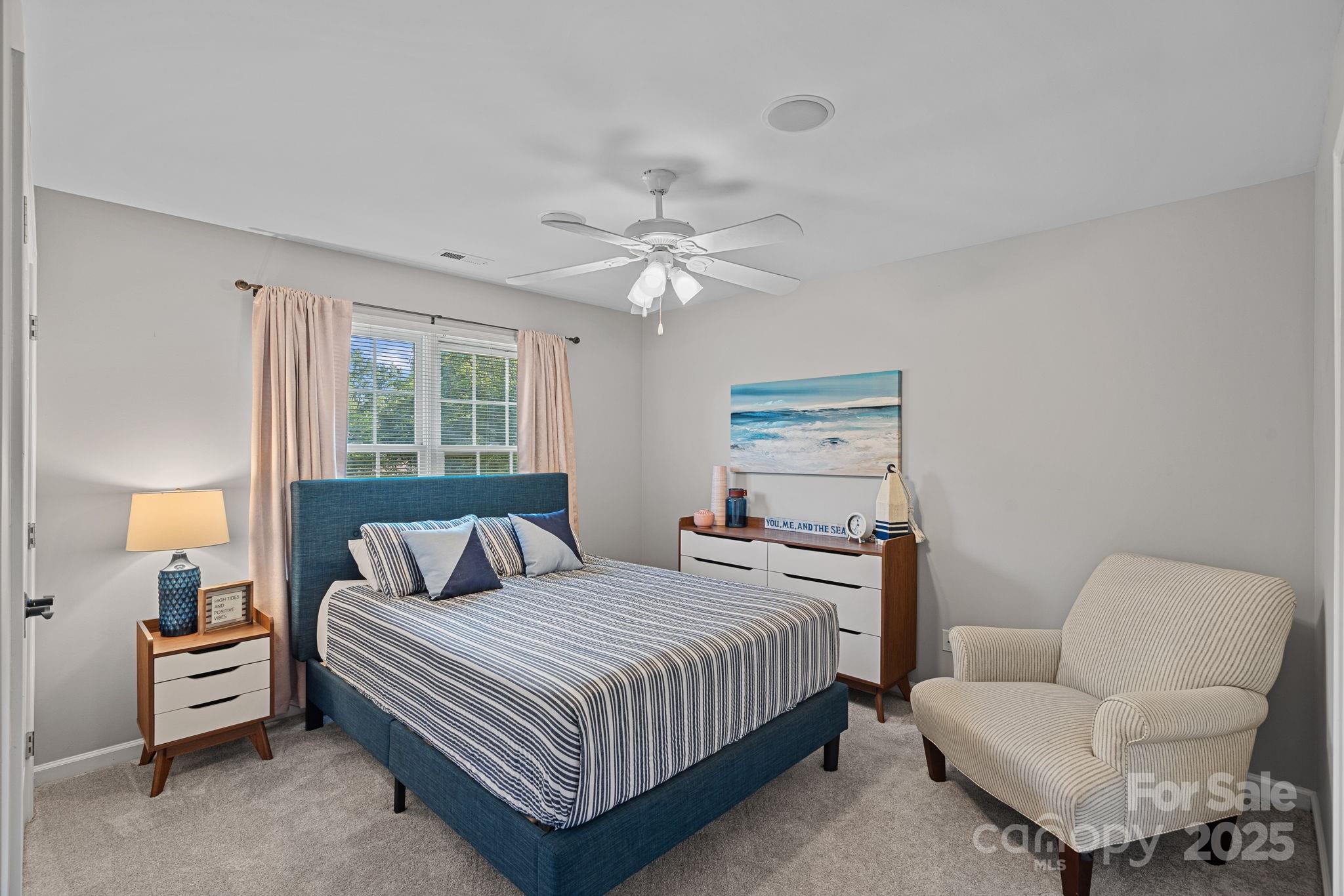 343 Gringley Hill Road Fort Mill, SC 29708 - Photo 22 of 45 a bedroom with a bed and a couch