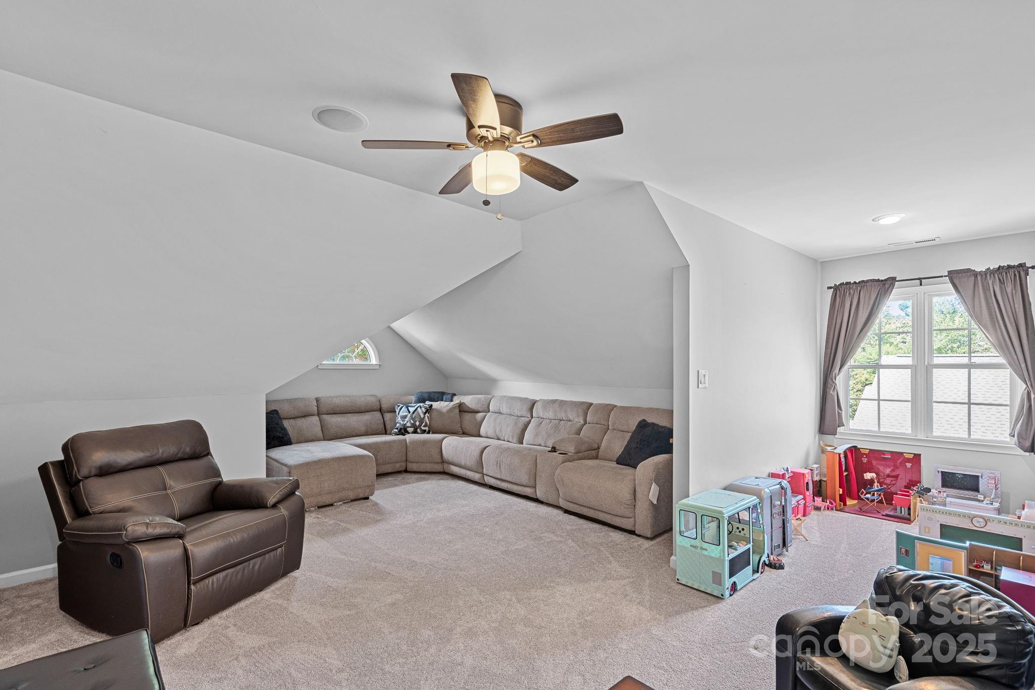 343 Gringley Hill Road Fort Mill, SC 29708 - Photo 25 of 45 a living room with furniture and a large window