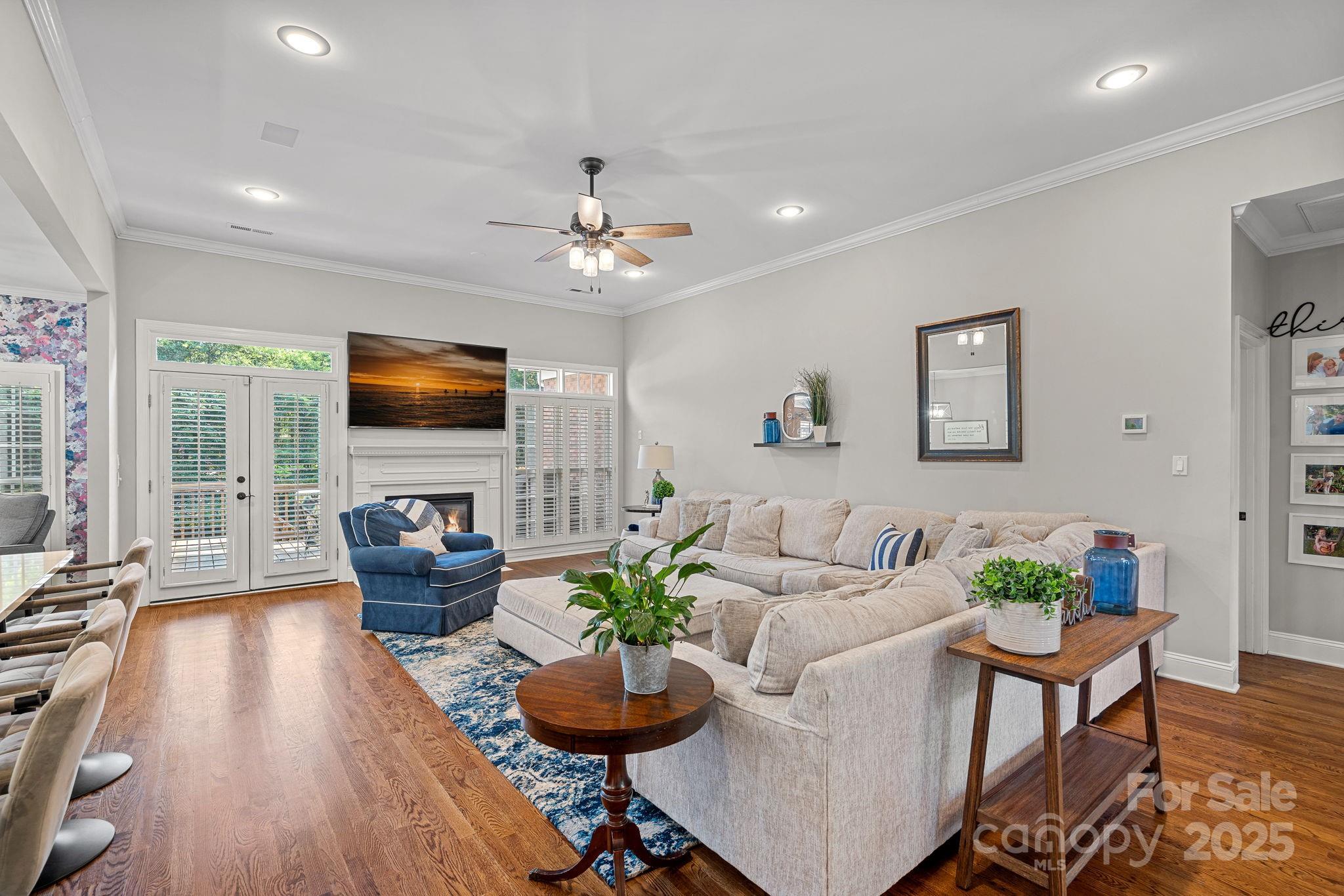 343 Gringley Hill Road Fort Mill, SC 29708 - Photo 28 of 45 a living room with furniture and a flat screen tv
