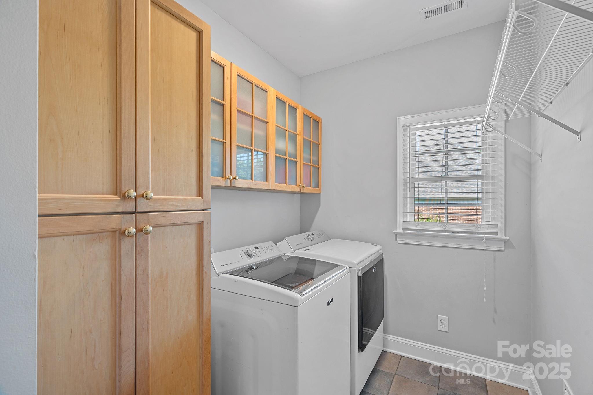343 Gringley Hill Road Fort Mill, SC 29708 - Photo 36 of 45 a utility room with dryer and washer